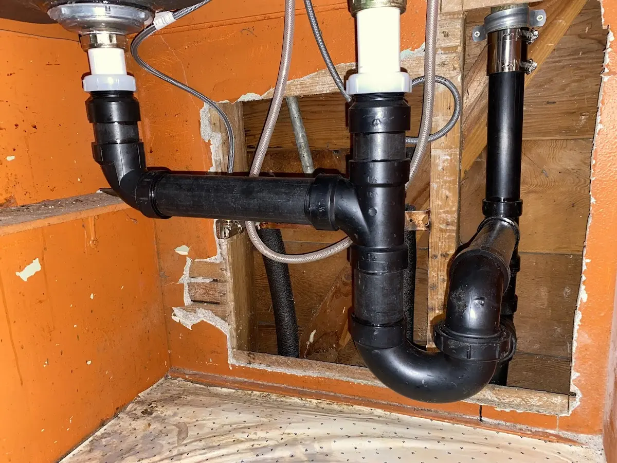 Professional Garbage Disposal Repair equipment and tools on the job in Sandersville